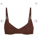SKIMS Wireless Form Push-Up Plunge Bra - Cocoa - 34D Photo 1