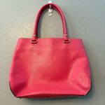 Kate Spade bright coral pink colored tote bag with snap closure and tassels Photo 8