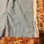Nike Light Blue Track Pants with White Stripe Photo 7