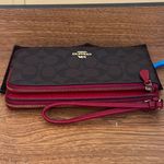 Coach Signature Wristlet in Brown and Red Photo 3