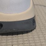 Nike White and Gold Athletic Sneakers Photo 6