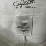 Jaclyn Smith  White Denim Skirt Photo 2