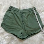 Gymshark 's green athletic shorts Photo 3