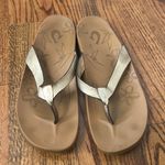 Olukai  copper leather flip flop size 7 Photo 1