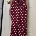 Missguided  | Burgundy Red Polka Dot Halterneck Wide Leg Open-Back Jumpsuit Photo 1