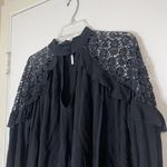Free People  long sleeve black embroidered ruffle hem blouse top small Photo 1
