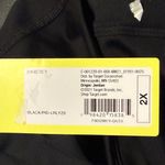 All In Motion Women's Black High-Rise Woven Pleated Skort Photo 6