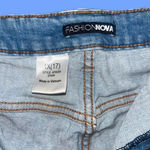 FashioNova Mid-waisted blue denim shorts  Photo 2