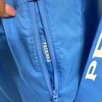 Columbia PFG Morning View Packable Windbreaker Full Zip Hooded Jacket in blue. Photo 1