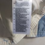 Adidas  Women's Printed Primeblue Golf Jacket Size L Photo 9