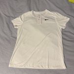Nike  DRI FIT Short Sleeve Shirt Photo 0
