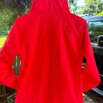 The North Face women’s hooded hyvent neon orange jacket Photo 8