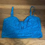 Roxy Turquoise cropped top with lacy pattern. With adjustable straps. Size L, . Photo 0