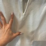 Women size small loose fit white top elegant dressy material Photo 3