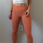 Nike Orange  Dri-Fit leggings  Photo 0