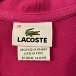 Lacoste  Women’s Shirt size 38 excellent condition color pink Photo 6