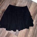 Juicy Couture Black mini skirt with ruffles #miniskirt    black ruffle, mini skirt, feminine style, layered, flared, chic, elegant, evening wear, trendy, versatile Photo 0