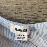 Garage  light blue shirt Photo 2