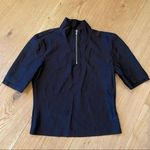 Callipygian Opening Ceremony Scuba Half Zip Short Sleeve Top in Black Size XS Photo 0