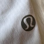 Lululemon Size 6 Turbo Running Short in white with a mint green waistband Photo 4