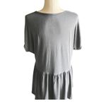 Torrid Super soft babydoll top, short sleeves, v neck, lots of stretch, excellent condition, size 1x Measurements: Bust: armpit to armpit 25 inches Length: shoulder seam to bottom 29 inches Photo 6