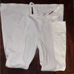 Edikted  Kira Cutout White Flare Jeans Party Going Out Bar Photo 3