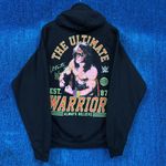 Ripple Junction WWE Legends James Hellwig “The Ultimate Warrior Always Believe” Hoodie Size XL Photo 0