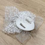 Elegant White Feathered Hair Accessory Photo 1