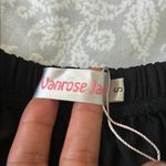 Elegant Black Lace Trim Mini Skirt Photo 1