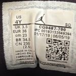 Air Jordan 1 Low GS ‘Gold Toe’ Photo 6