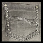 Earl Jean Earl jeans Gray with rhinestone pockets- size 6. ***Refer to measurements as size tag removed. Gently warn and excellent condition. Measurements approximately 14” waste x 37” long x 9” rise. Non smoking home. priced to sell at as is condition. Don’t like my price, make reasonable offer! And thank you for checking my closet. Photo 7