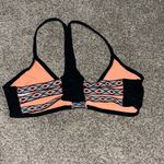 Cute swim too easy to pair with black bottoms size small Photo 1