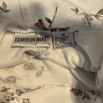 Fashion Bug  white floral turtle neck top Photo 1