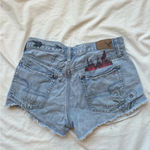 American Eagle Outfitters ripped distressed doodle festival shorts Photo 1