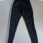 Adidas  Women’s Black Joggers with White Stripes Photo 3