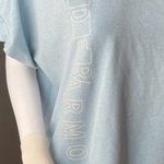 Under Armour Like New  active wear top size Large 
Like new condition 
Logo Photo 1