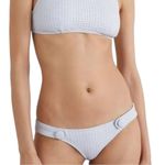 Lisa Marie Fernandez Button Photo 1