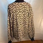 Glam  Chic Leopard Print Blouse with Black Accents Photo 1