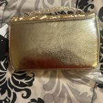 Nicole Miller Gold hand bag Photo 0