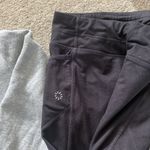 Athleta  black capri leggings, size small paired with H&M Hoodie S Photo 4