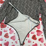 Banana Republic  Henley Bodysuit Black and White animal Pattern Long Sleeve XL Photo 3