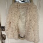 Main Strip  Fuzzy Coat Photo 2