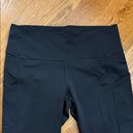 Lululemon  High-Rise Black Leggings with Side Pockets Size 12 Performance Pants Photo 3