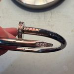 Silver Bent Bracelet with Bejeweled Nail Edges Photo 2