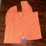 Fabletics Oasis PureLuxe High-Waisted Twist 7/8 Legging- Coral Haze Photo 4