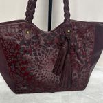 Isabella Fiore  Burgundy Tote with Braided Handles and Floral Embossing Photo 0