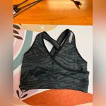 Gymshark ADAPT ANIMAL SEAMLESS SPORTS BRA
Medium Support Tiger Size Small Photo 2