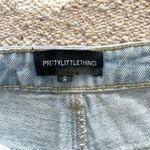 Pretty Little Thing Kendall Light Wash Super Distressed Mom Jeans Photo 12