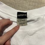 Pink Lily NASHVILLE BOOTS WHITE CROPPED CORDED GRAPHIC SWEATSHIRT Photo 3