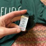 Rae Dunn  DARK GREEN HOLIDAY BELIEVE STRETCH LONG SLEEVE Photo 2